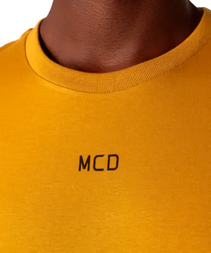 Camiseta MCD Regular Triade Mostarda Bronze
