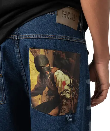 Calça MCD Jeans Travis Bomb Loose Core Bomb