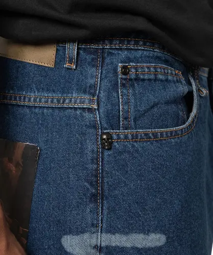 Calça MCD Jeans Travis Bomb Loose Core Bomb